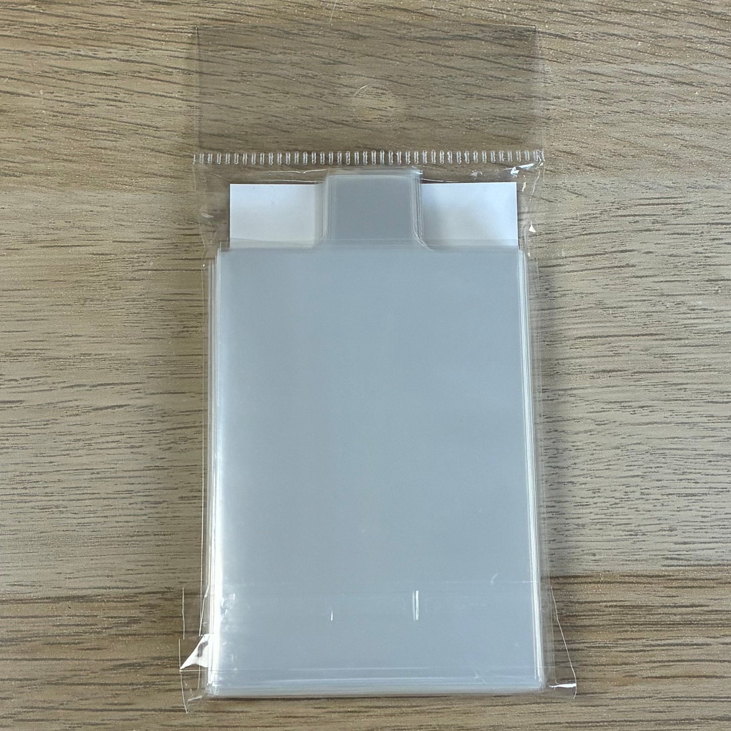 toploaders et sleeves languettes demonshield